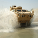 Illustration for article titled The M1117 Guardian: When A Hummer Makes Love To A Tank